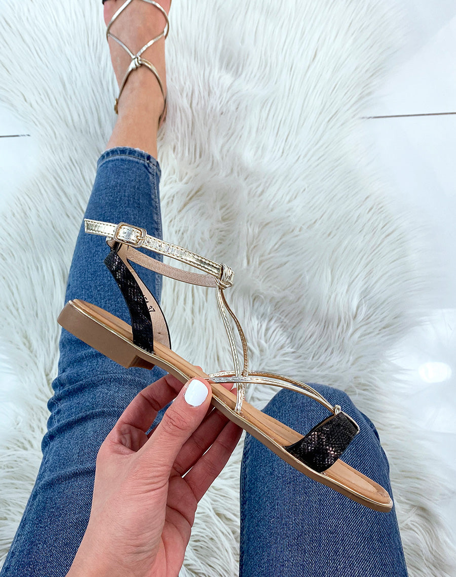 Nu-pieds à brides noires et dorées