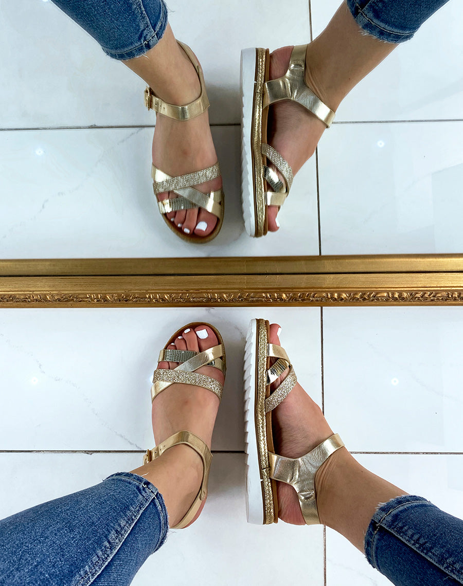 Nu-pieds dorés à brides entrecroisées