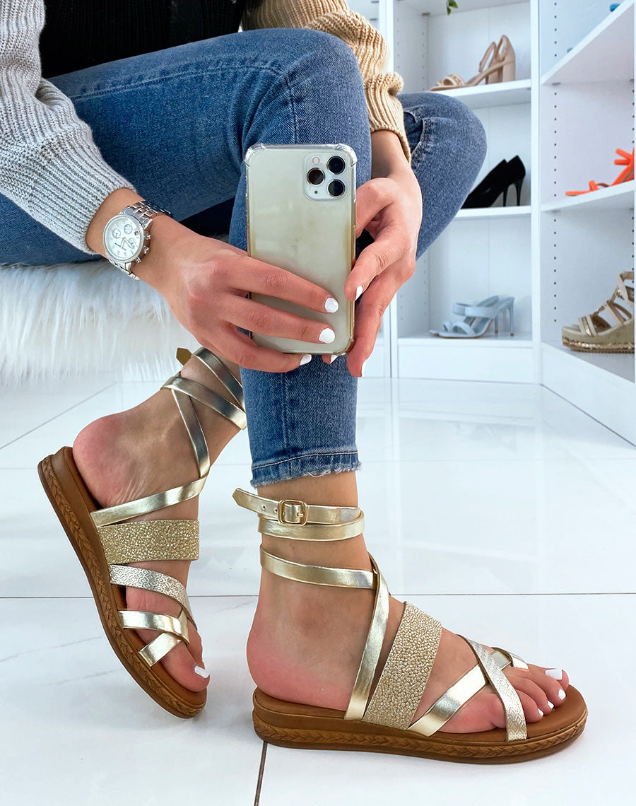 Nu-pieds dorés en cuir à brides entrecroisées