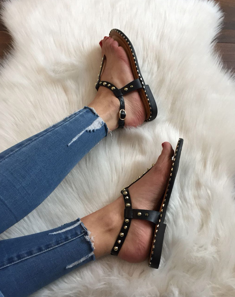 Nu pieds noirs cloutés or