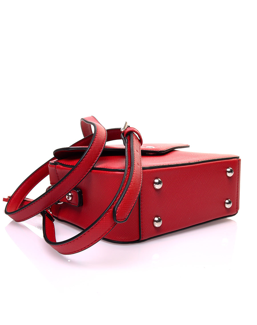 Petit sac bandoulière texturé rouge et fermeture pompon