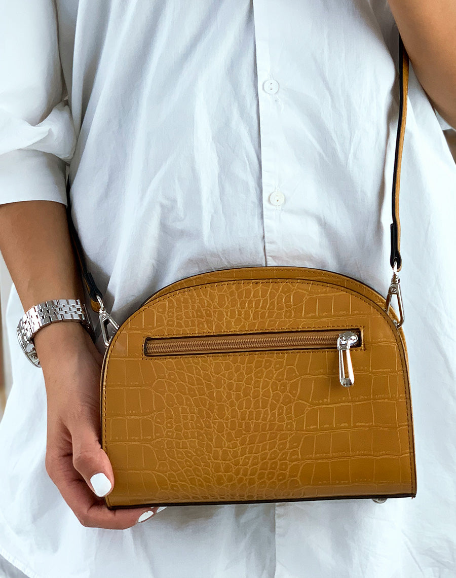 Pochette arrondie moutarde effet croco