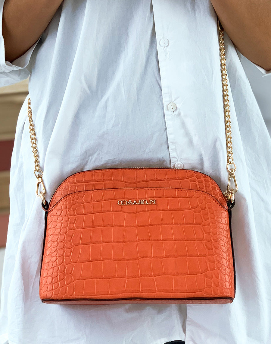 Pochette arrondie orange effet croco