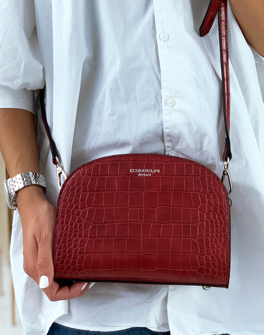 Pochette arrondie rouge effet croco