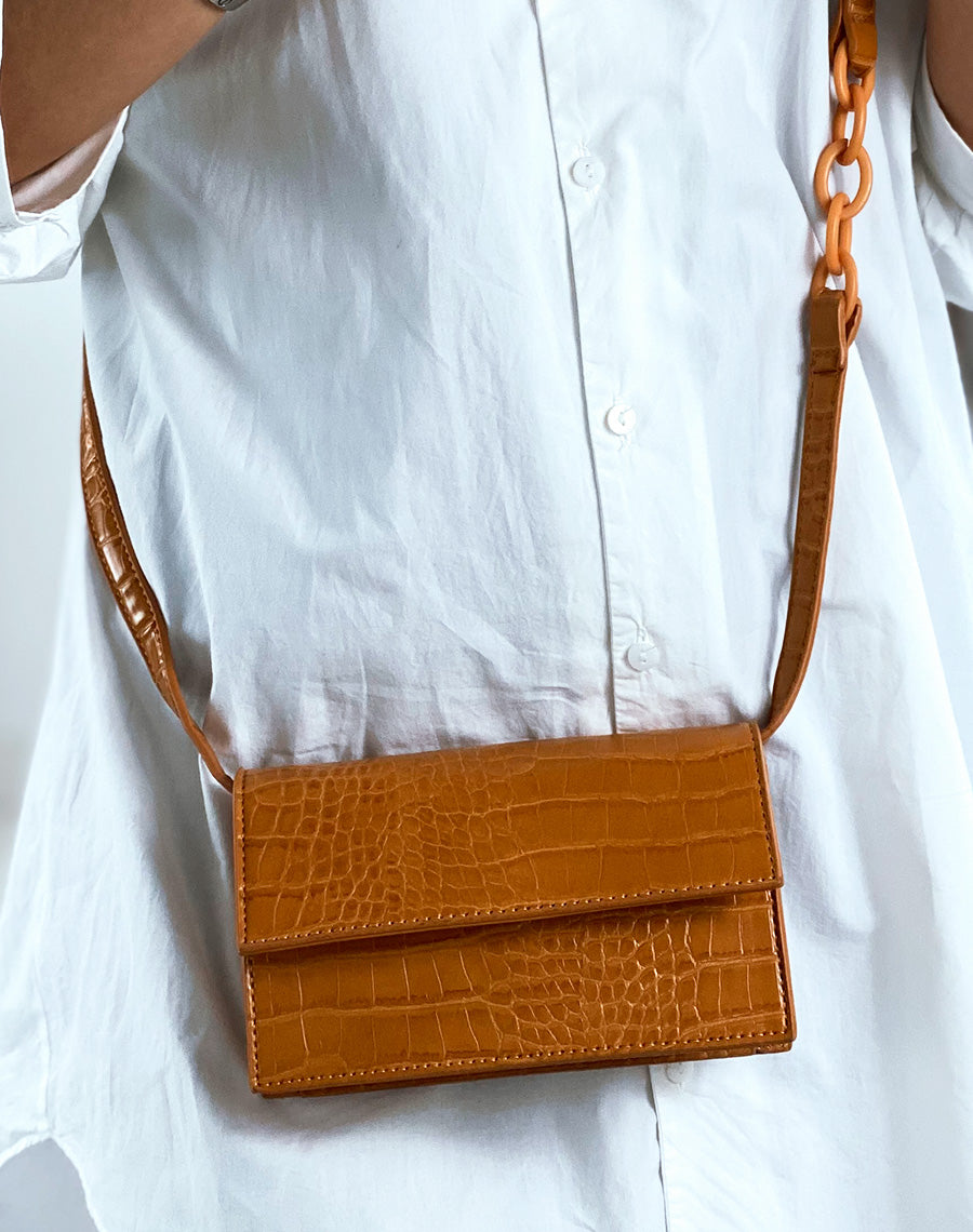 Pochette bandoulière effet croco moutarde
