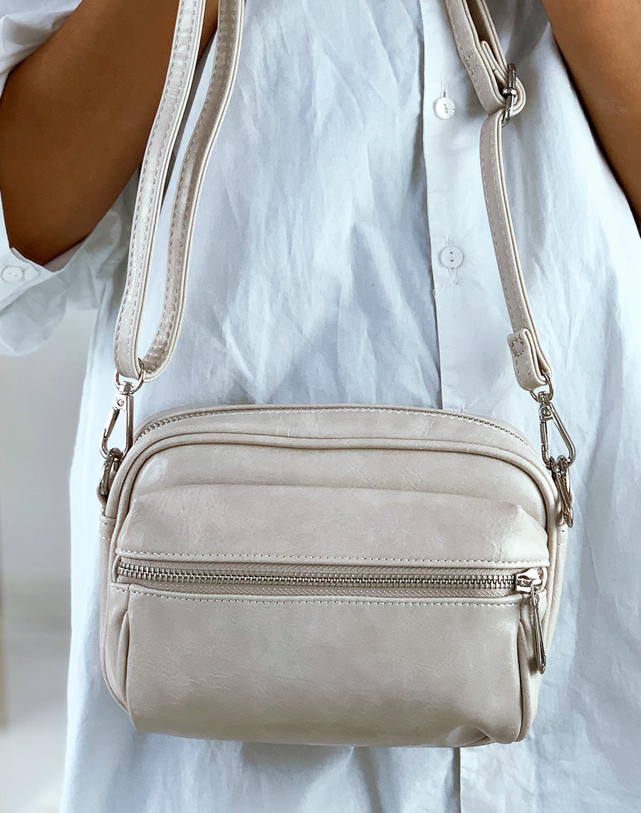 Pochette bandoulière à poche frontale beige