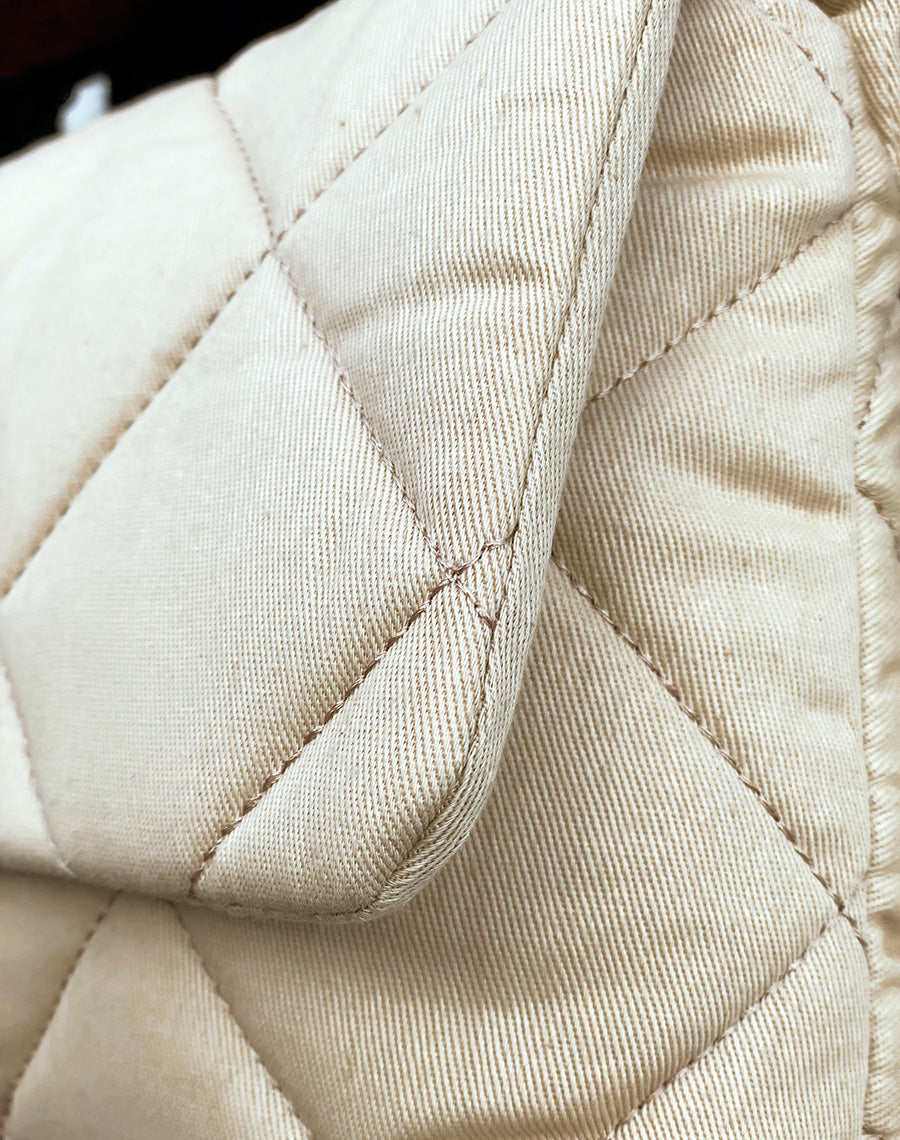 Pochette en jean beige matelassé