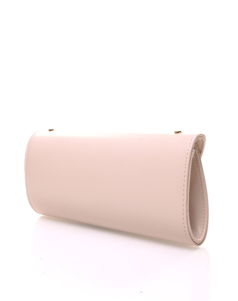 Pochette main cloutée beige
