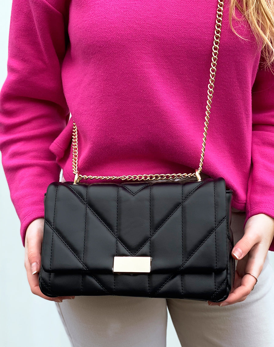 Pochette noire matelassée à détail doré