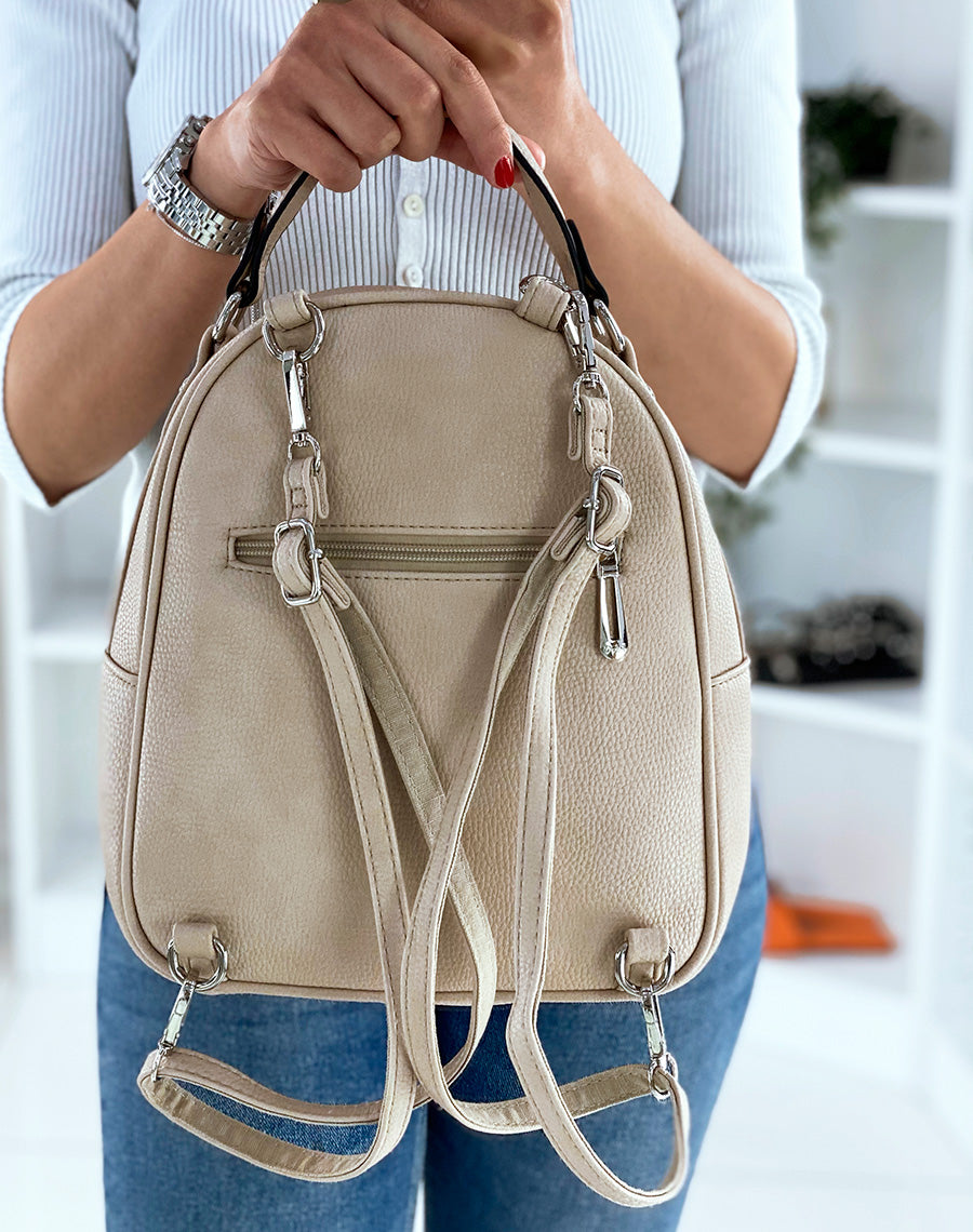 Sac à dos beige à zips argentés