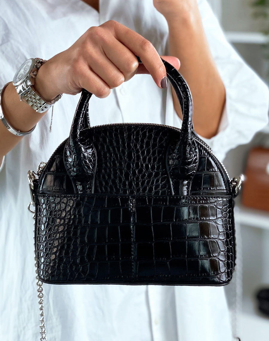 Sac en bandoulière noir arrondi effet croco