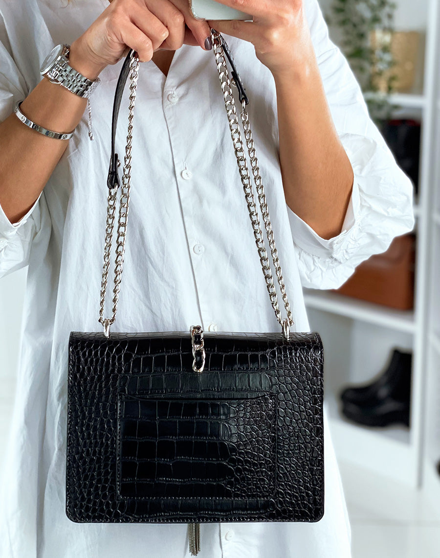 Sac en bandoulière noir effet croco à détails argentés