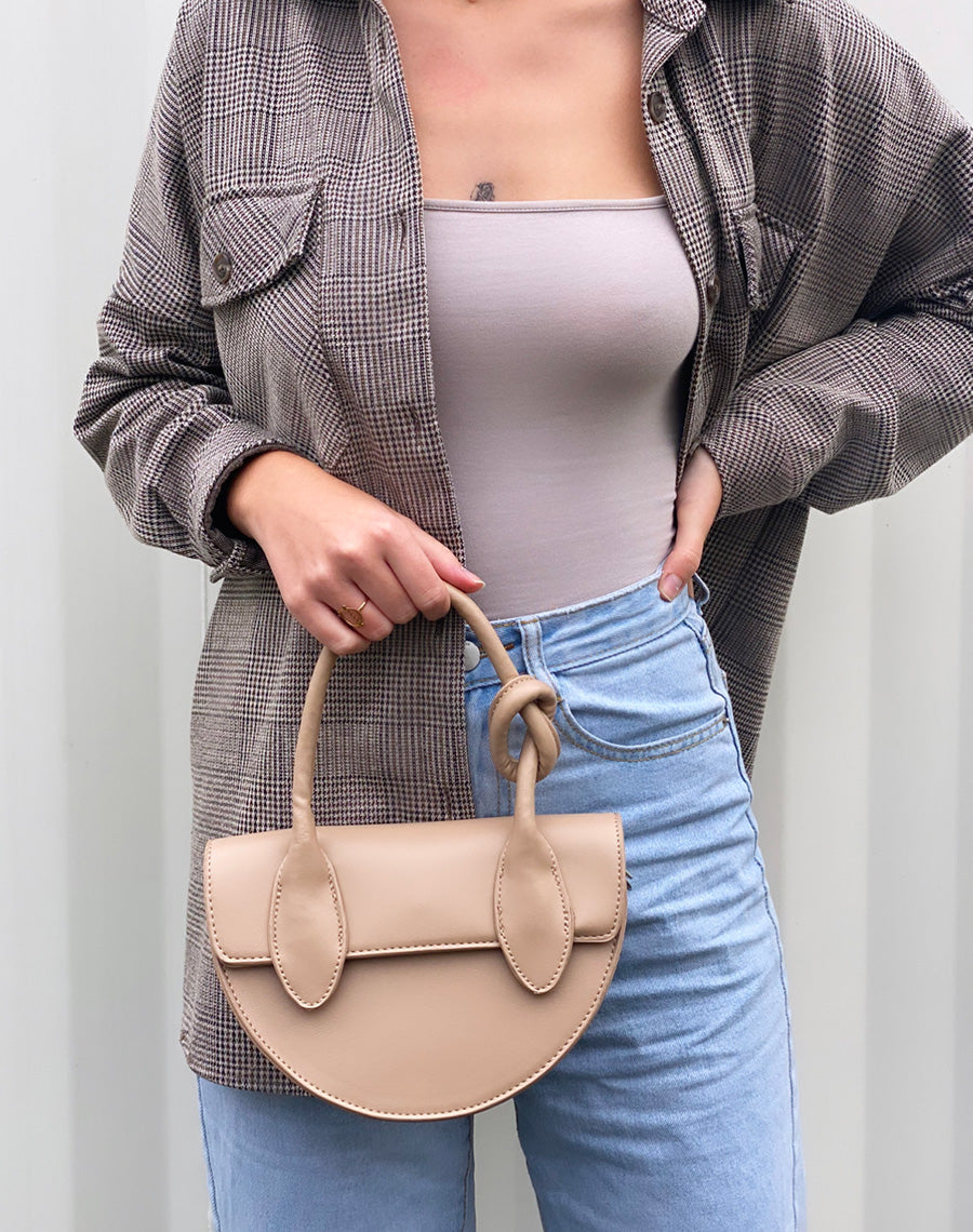 Sac à main arrondie beige à anse à nœud
