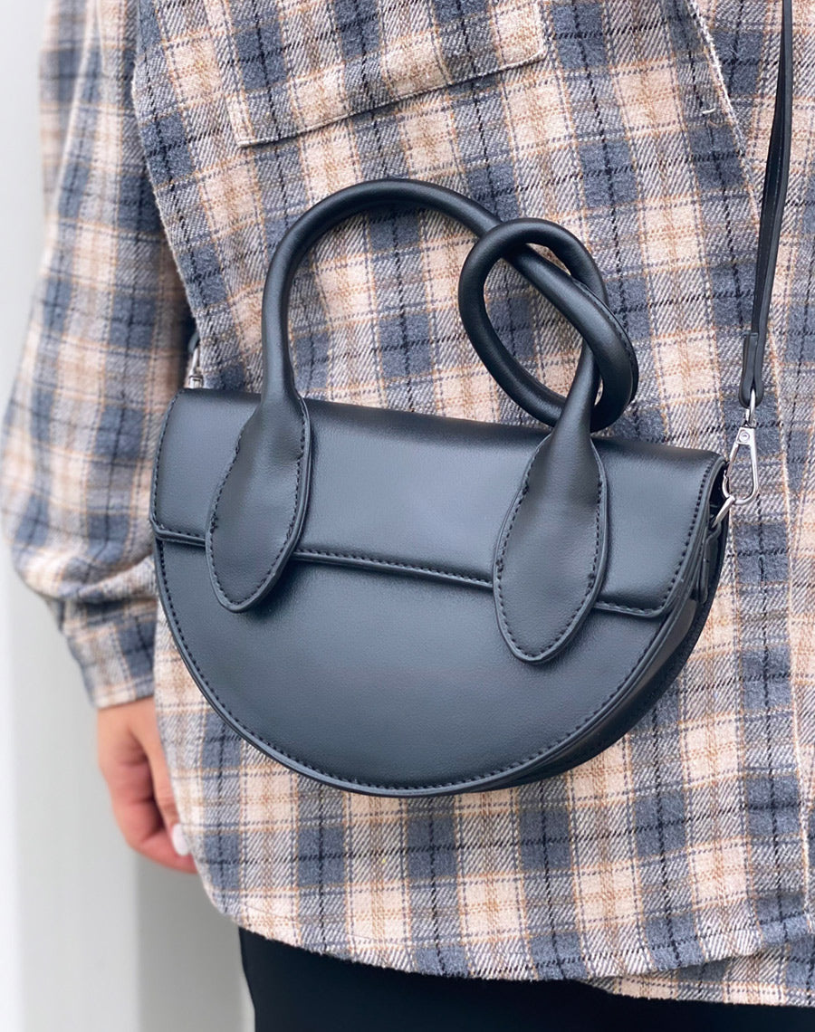 Sac à main arrondie noir à anse à nœud