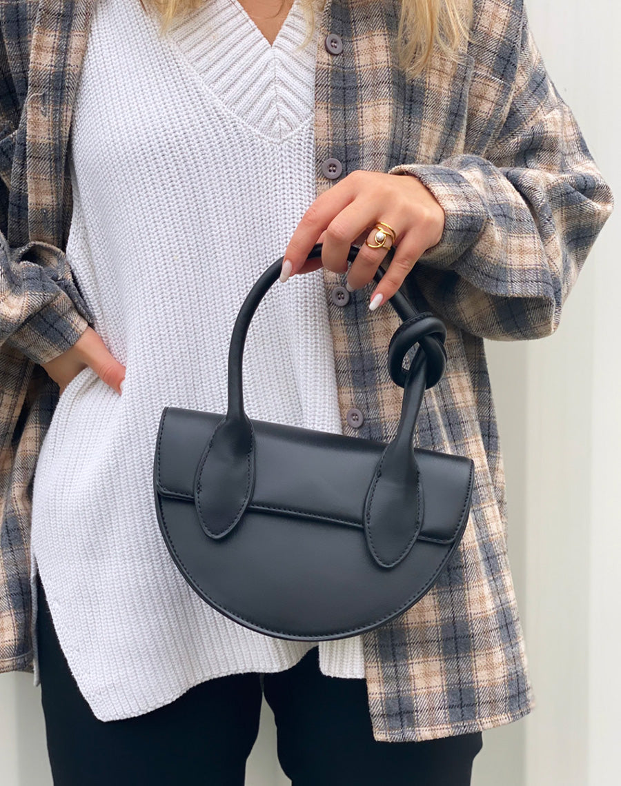 Sac à main arrondie noir à anse à nœud