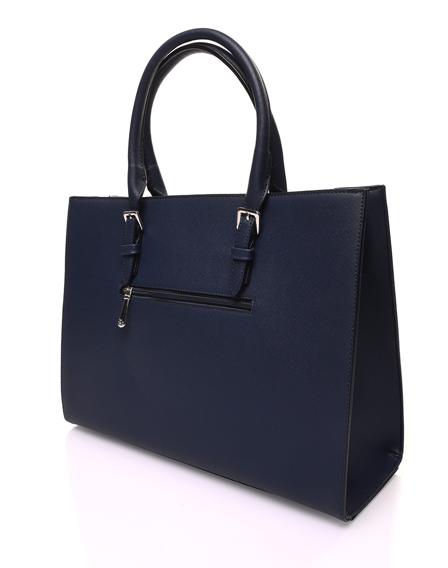 Sac à main bleu marine rigide de forme rectangulaire