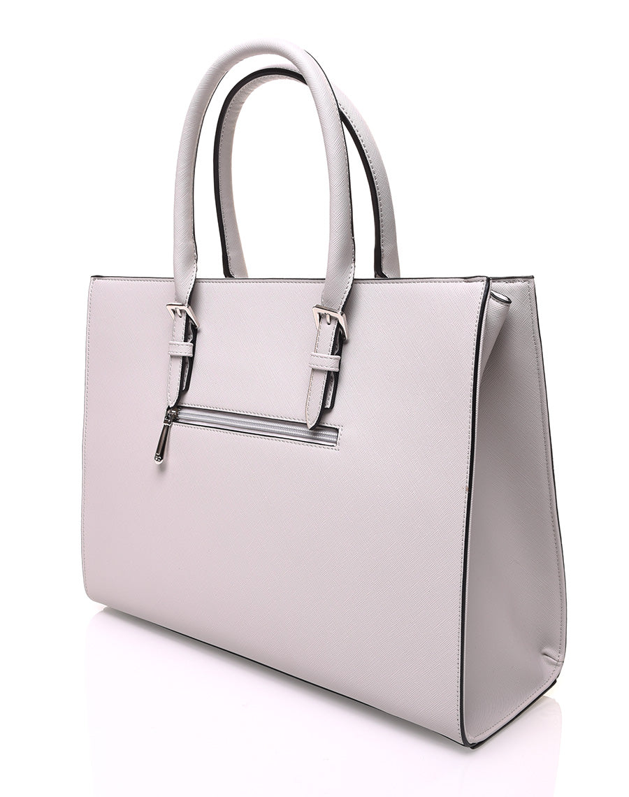 Sac à main gris clair rigide de forme rectangulaire