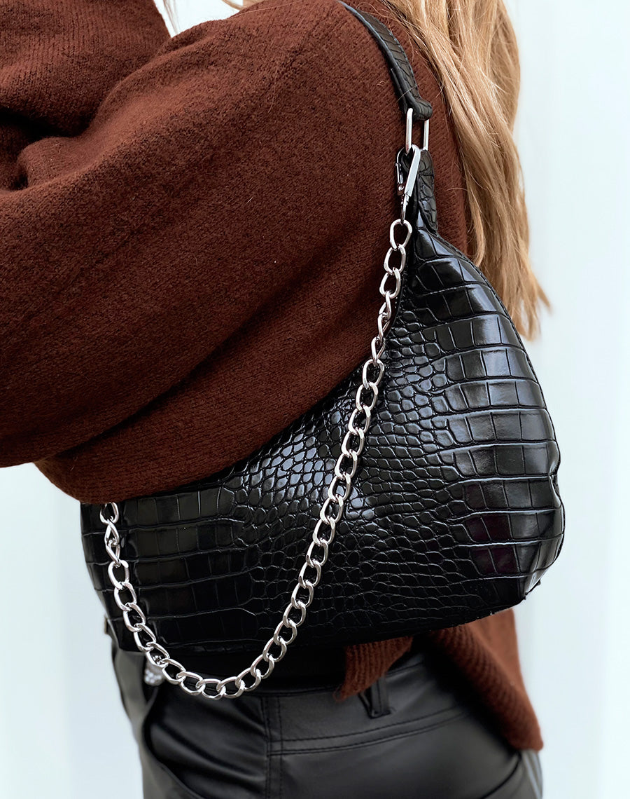Sac à main noir arrondi effet croco