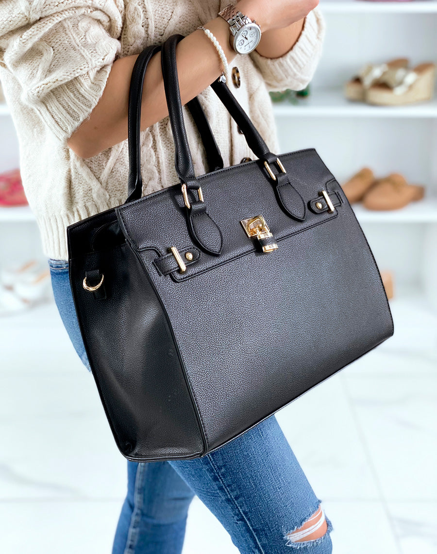 Sac à main noir à détails dorés