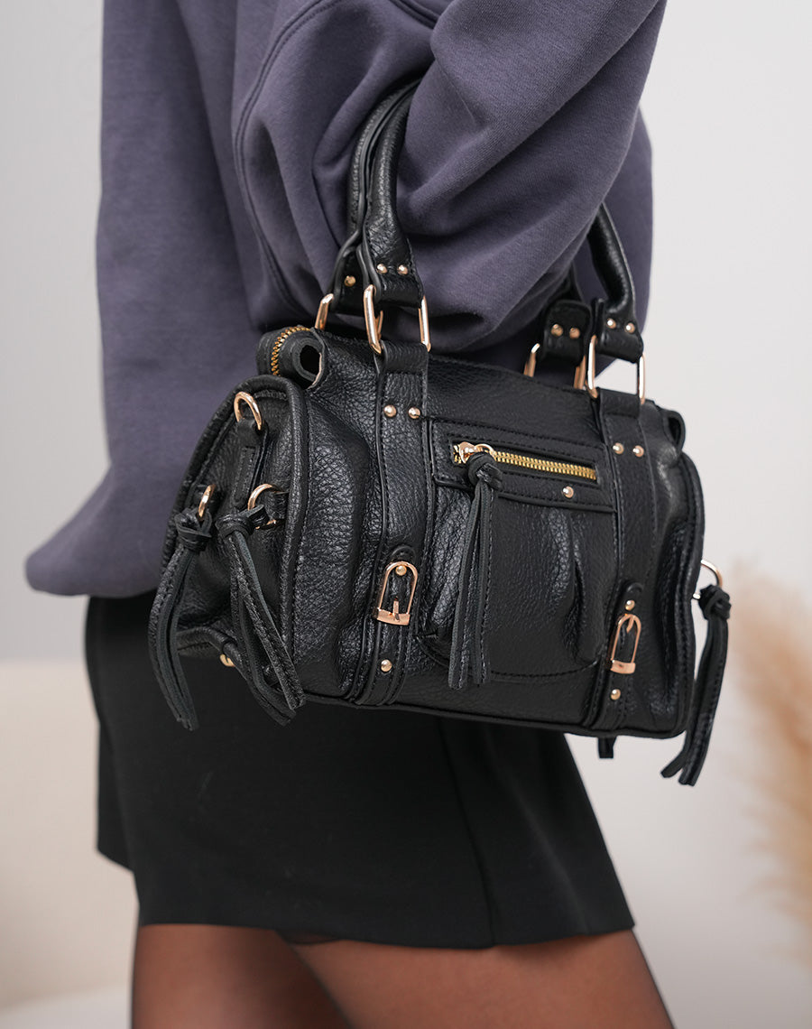 Sac à main noir à détails dorés