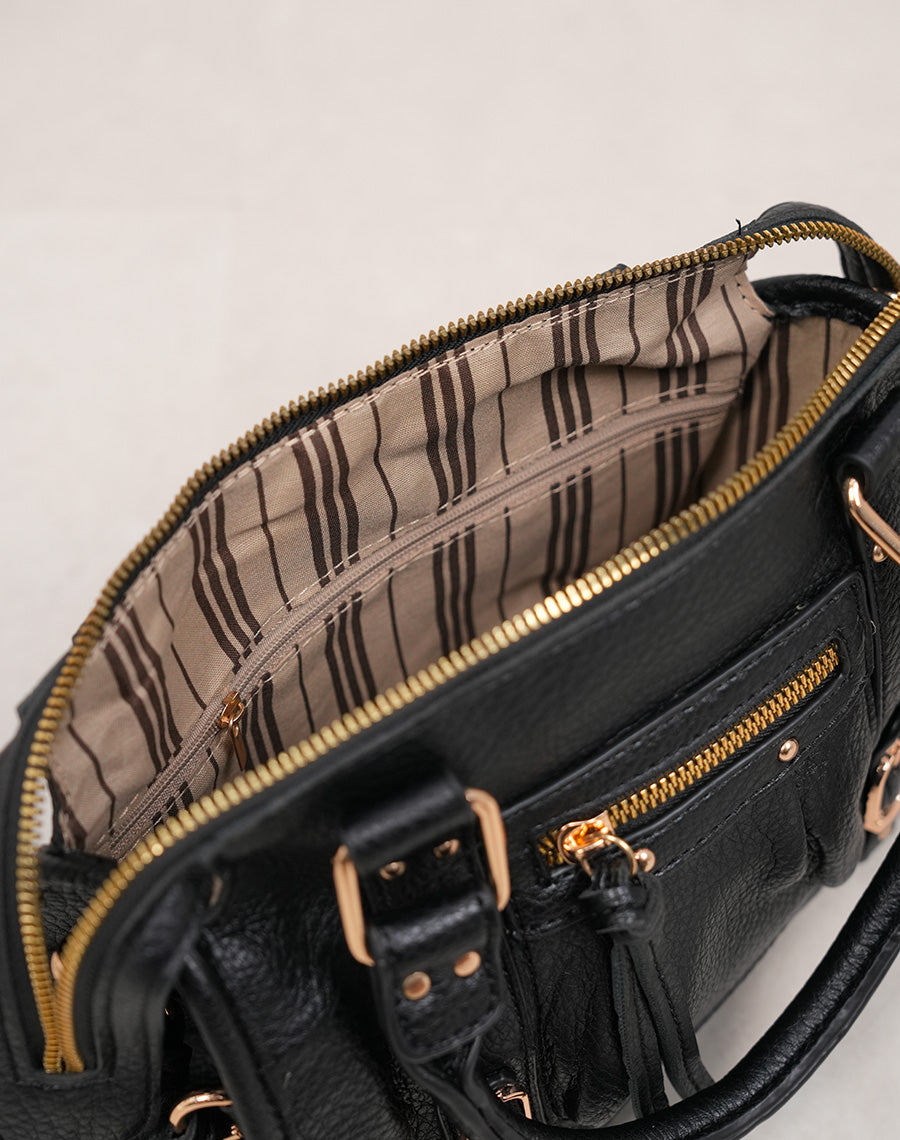 Sac à main noir à détails dorés