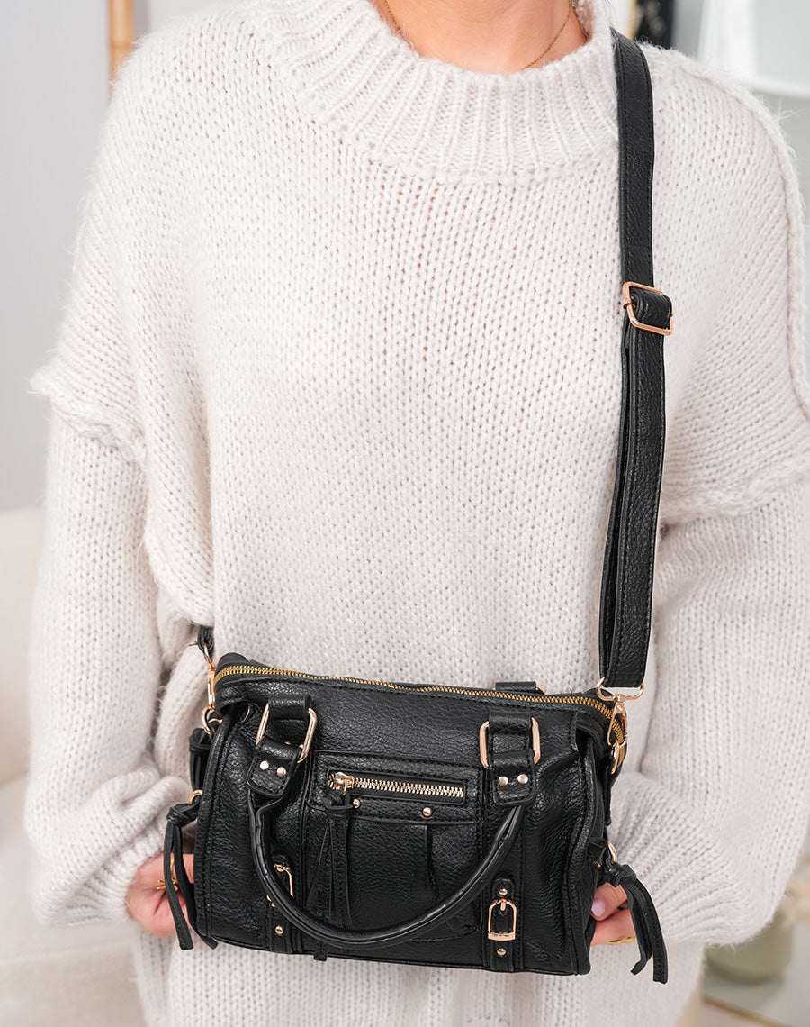 Sac à main noir à détails dorés