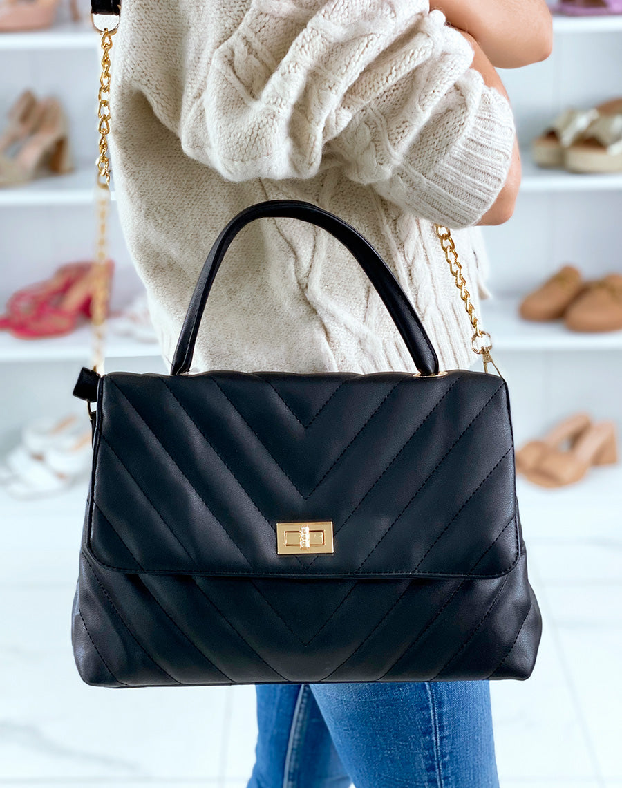 Sac à main noir matelassé