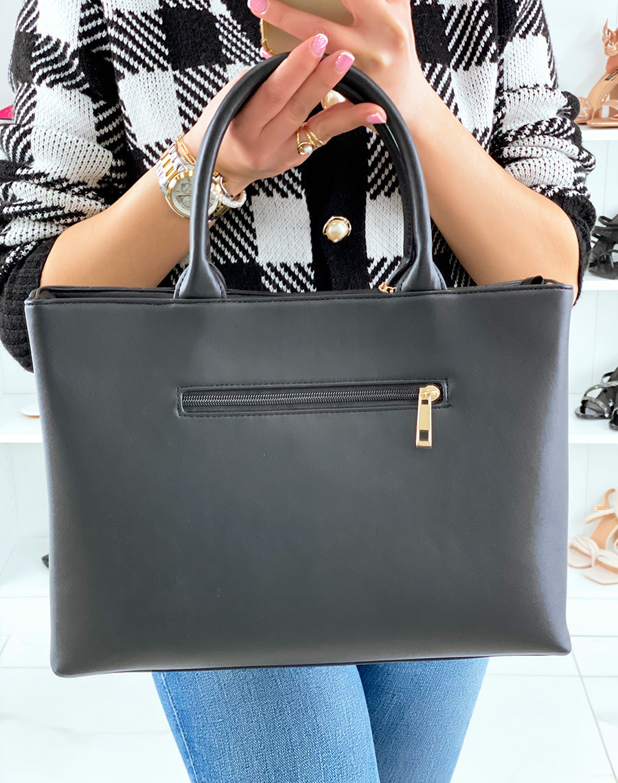 Sac à main noir matelassé à pendentif doré