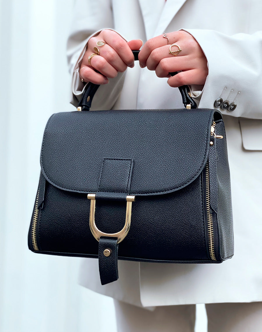 Sac à main noir à zips et bijou dorés