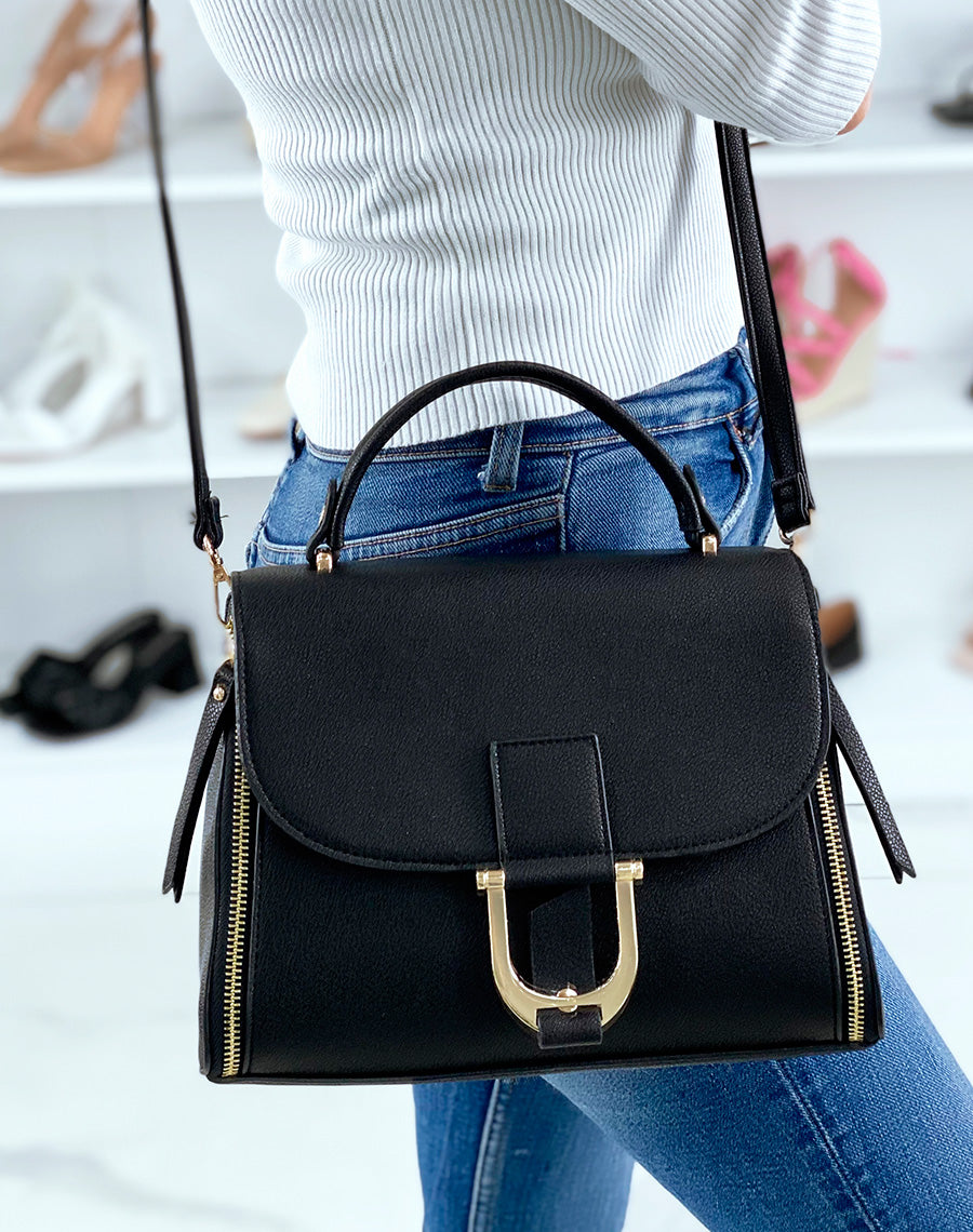 Sac à main noir à zips et bijou dorés