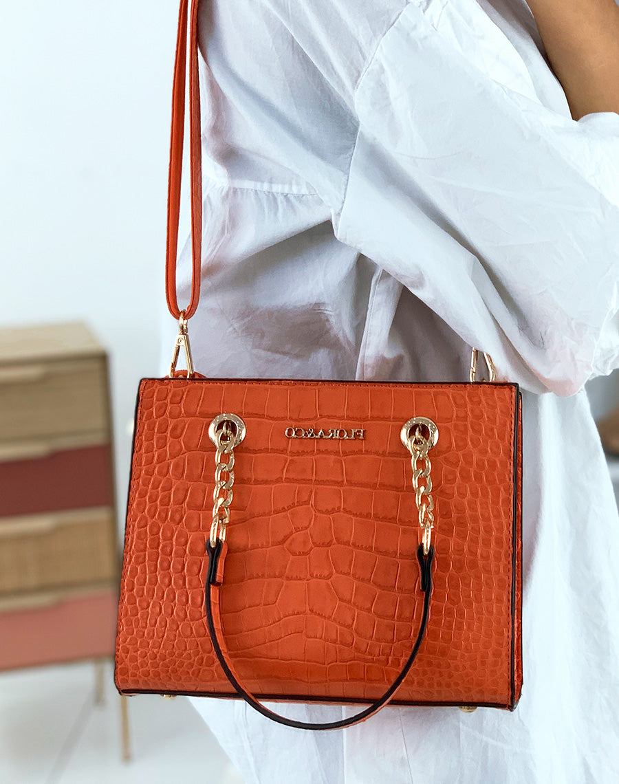Sac à main orange effet croco à chaînes dorées