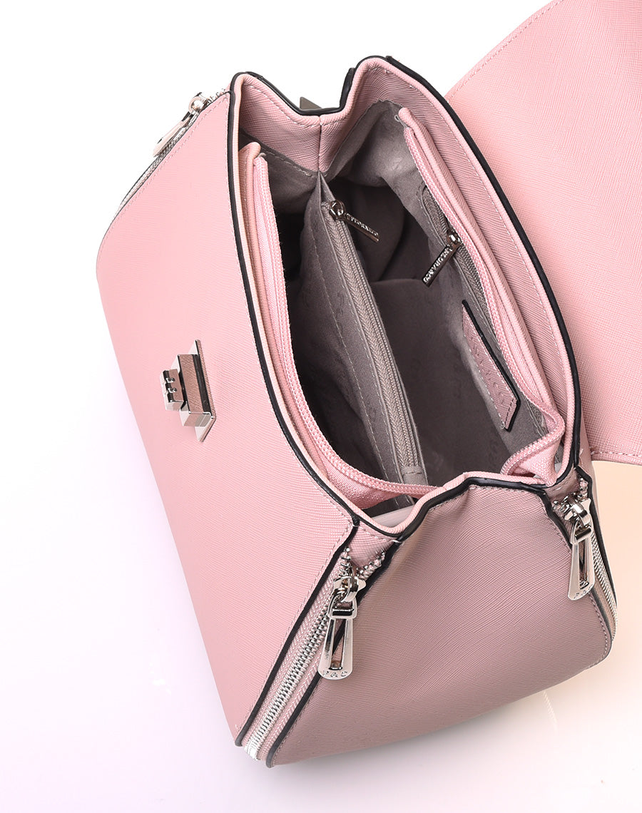 Sac à main rose pale à petite hanse avec verrou tournant