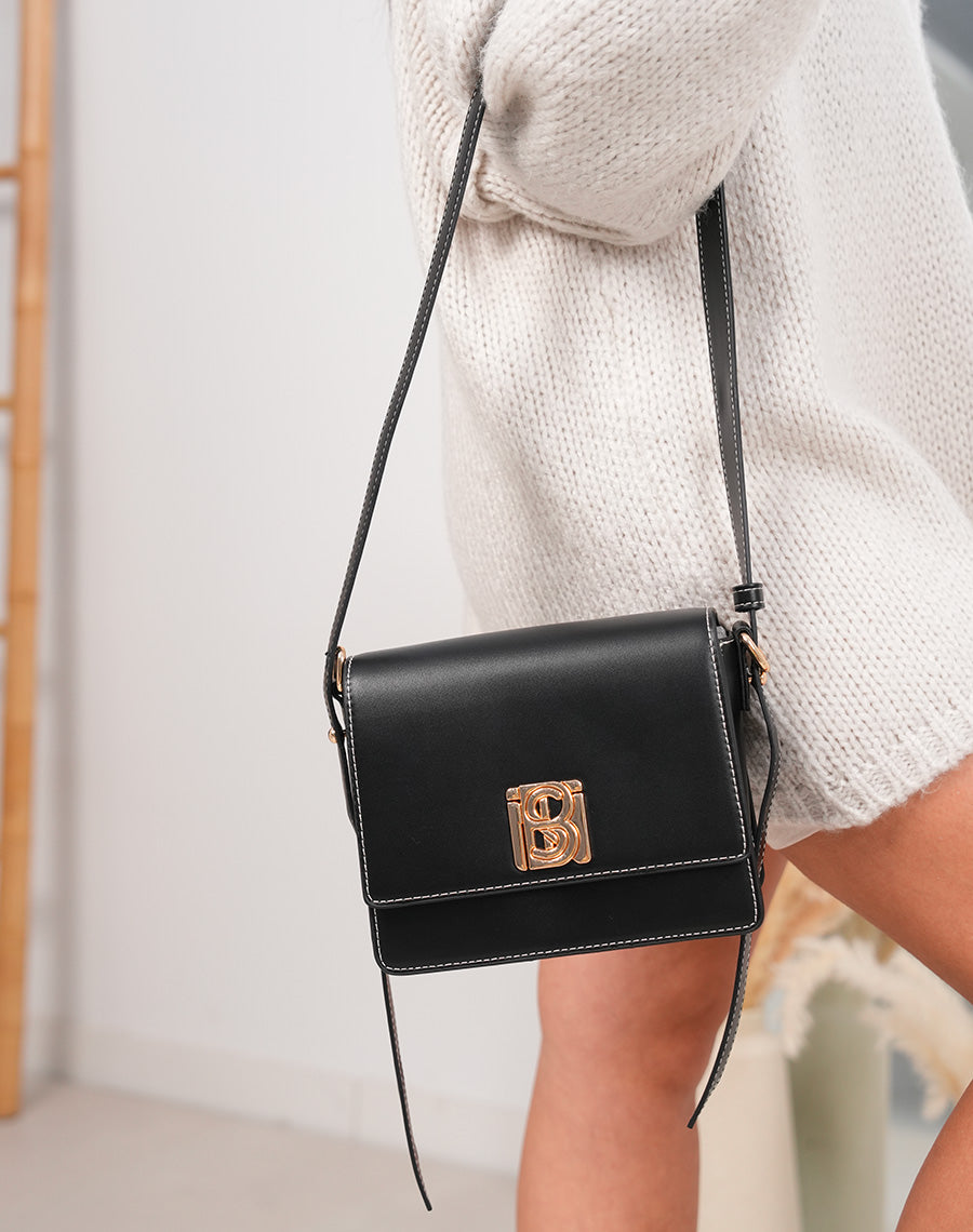 Sac noir à lanière ajustable