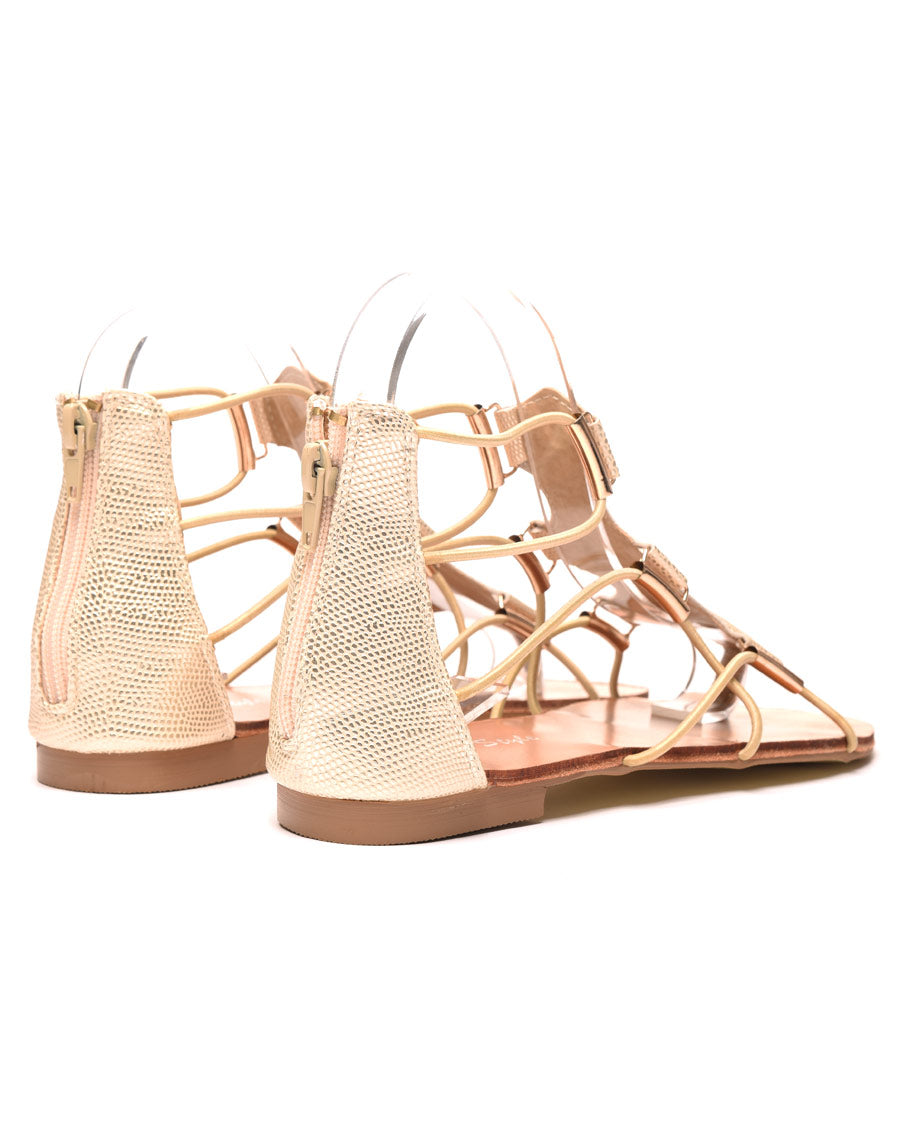 Sandale plate avec élastique doré