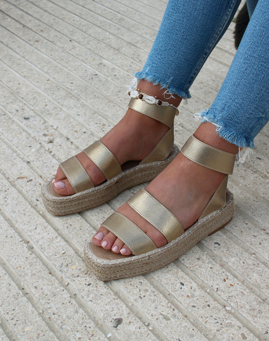 Sandales compensées dorés à brides élastiques