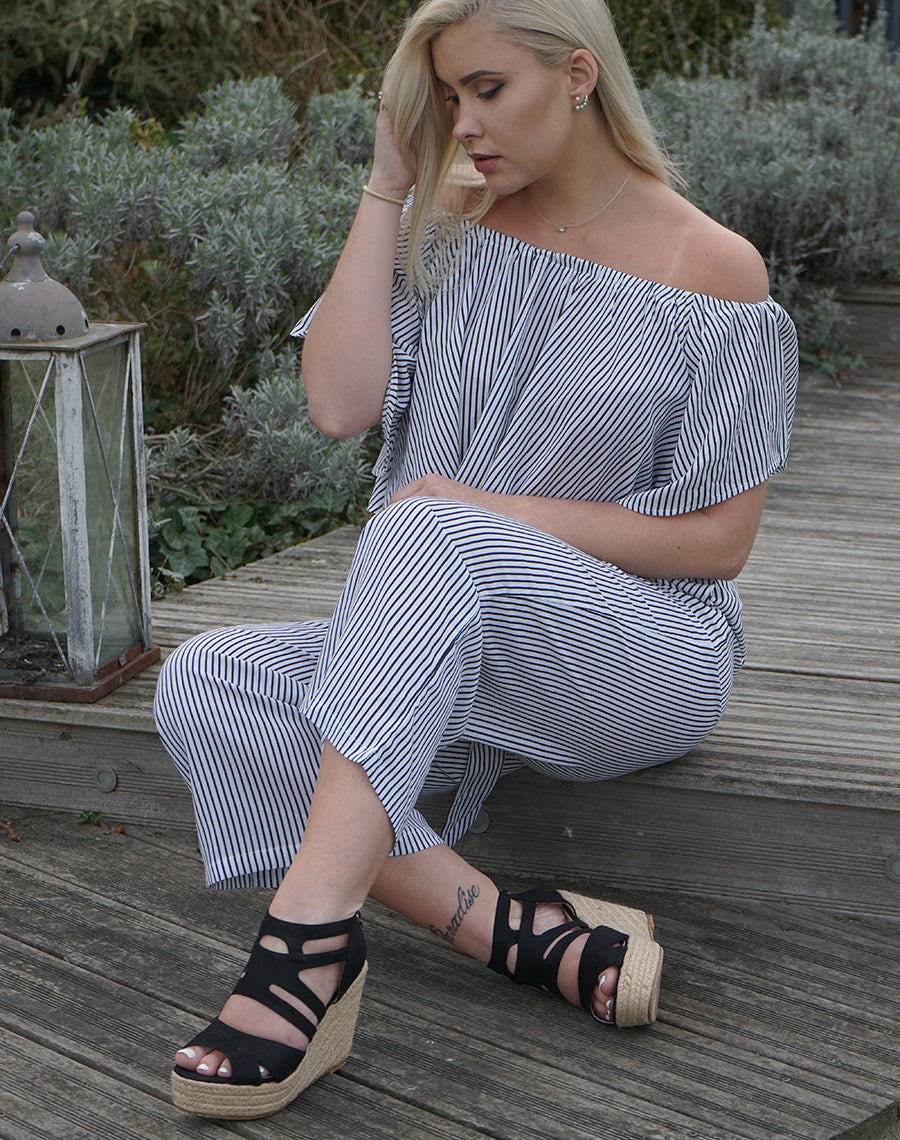 Sandales en suédine noires à talons compensés