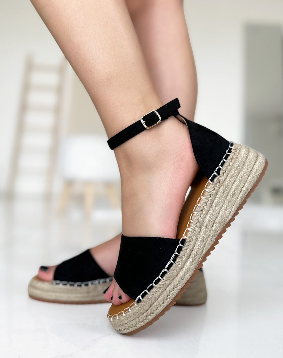 Sandales à plateformes en suédine noire avec coutures apparentes