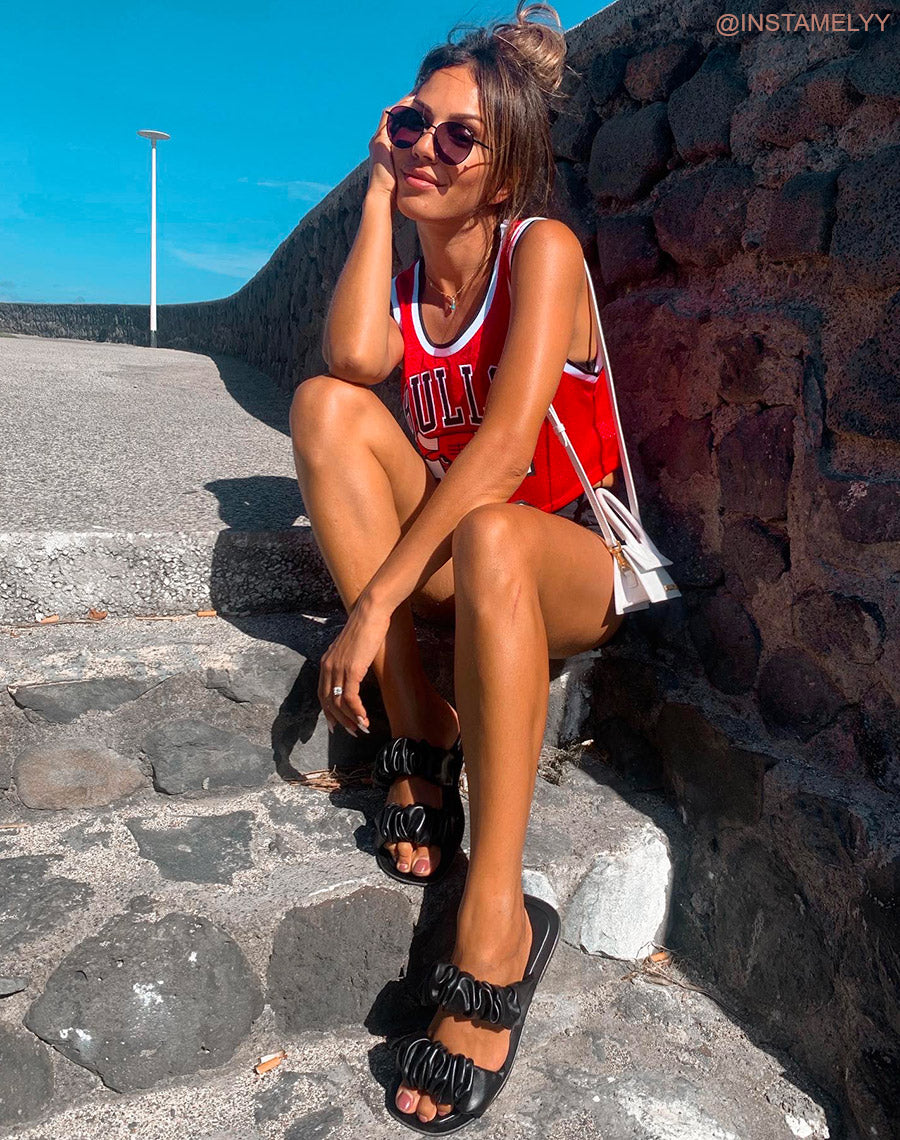 Sandales plates en simili cuir noires