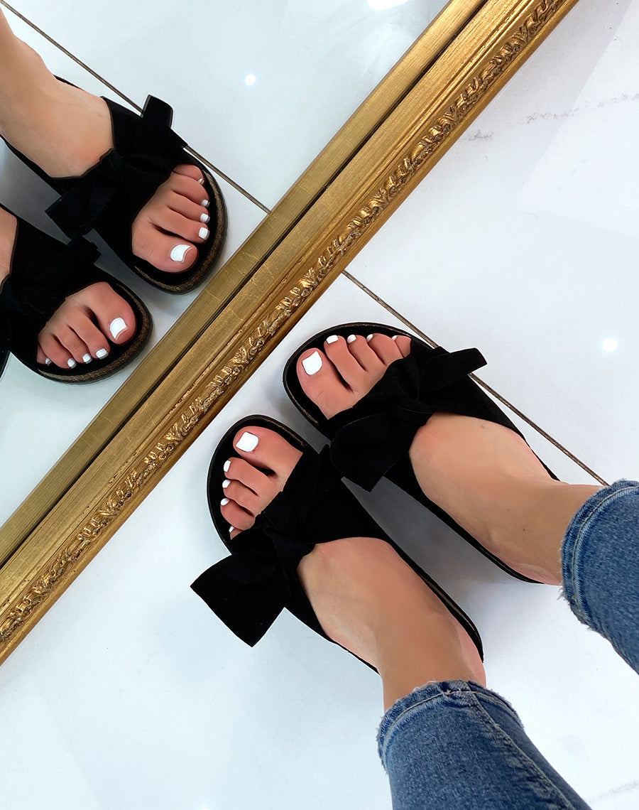 Sandales plates noires à gros nœud