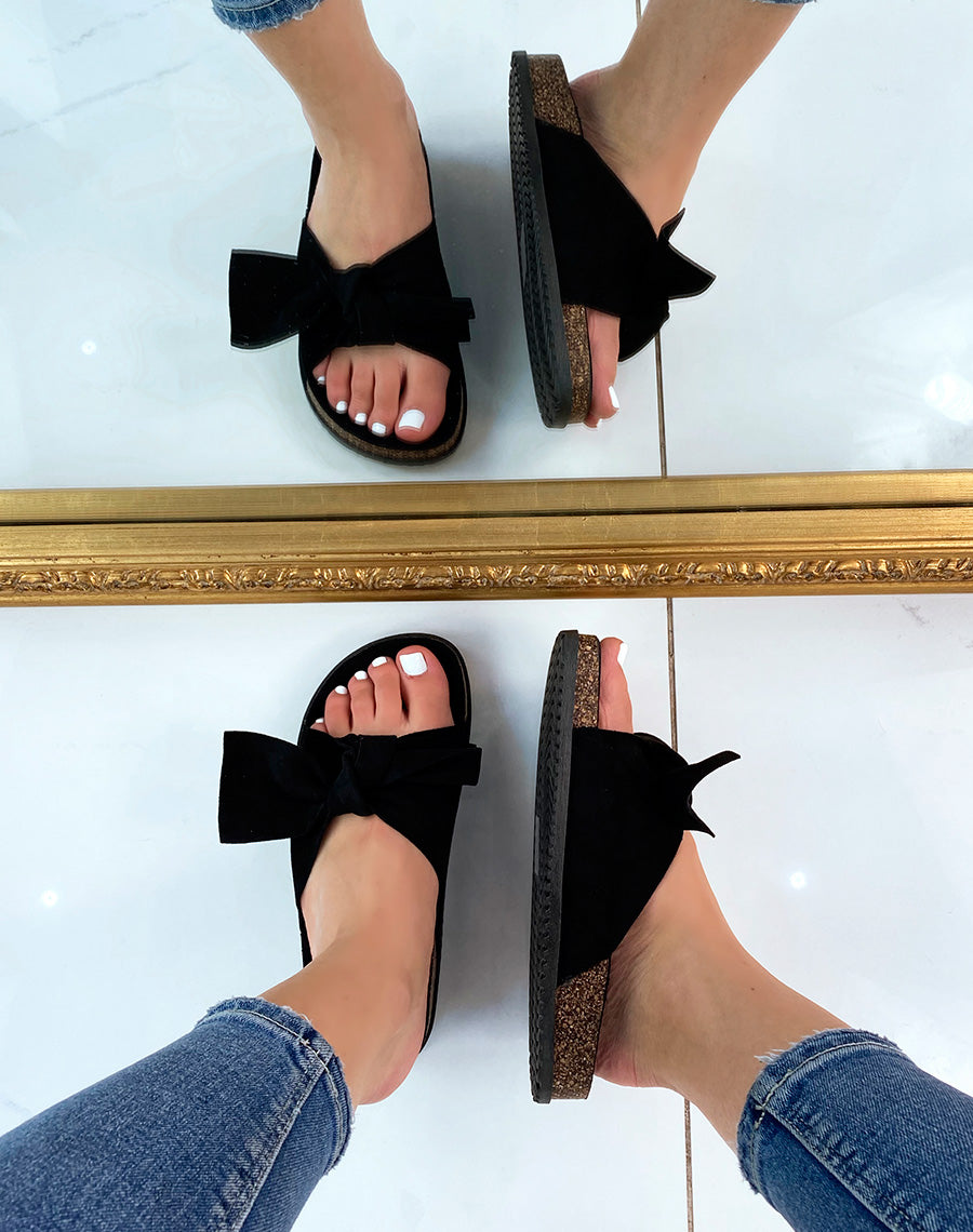 Sandales plates noires à gros nœud