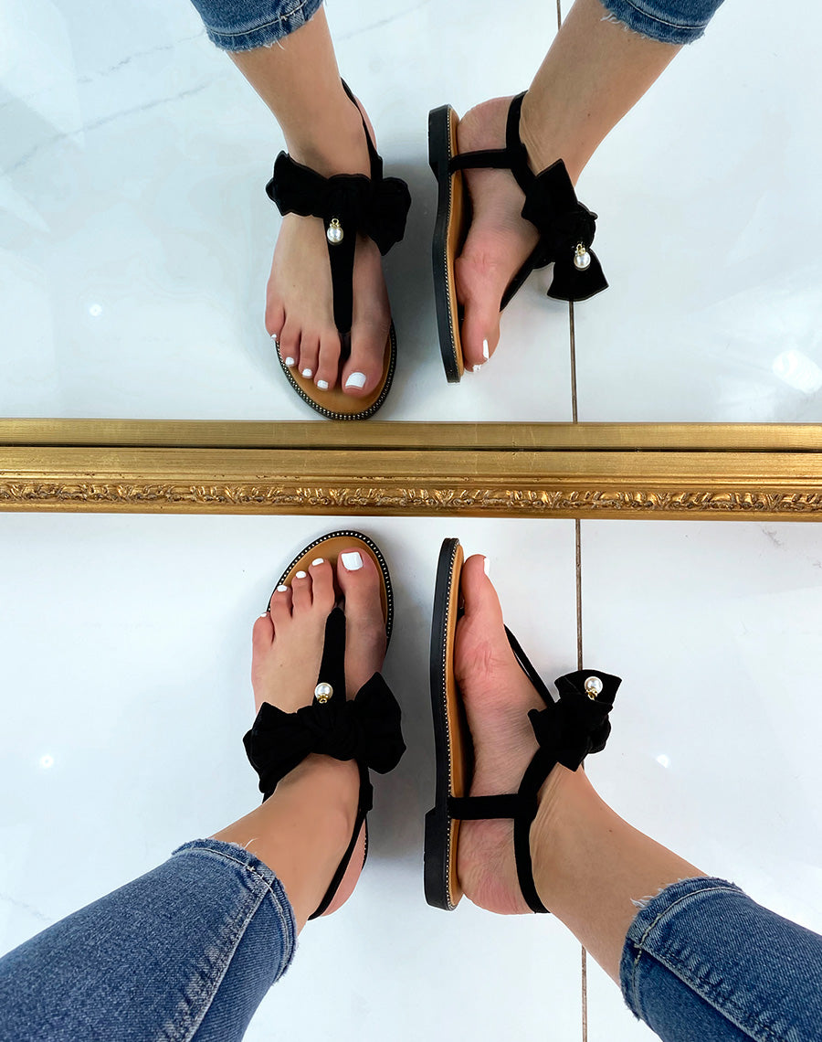 Sandales plates noires à nœud et petite perle