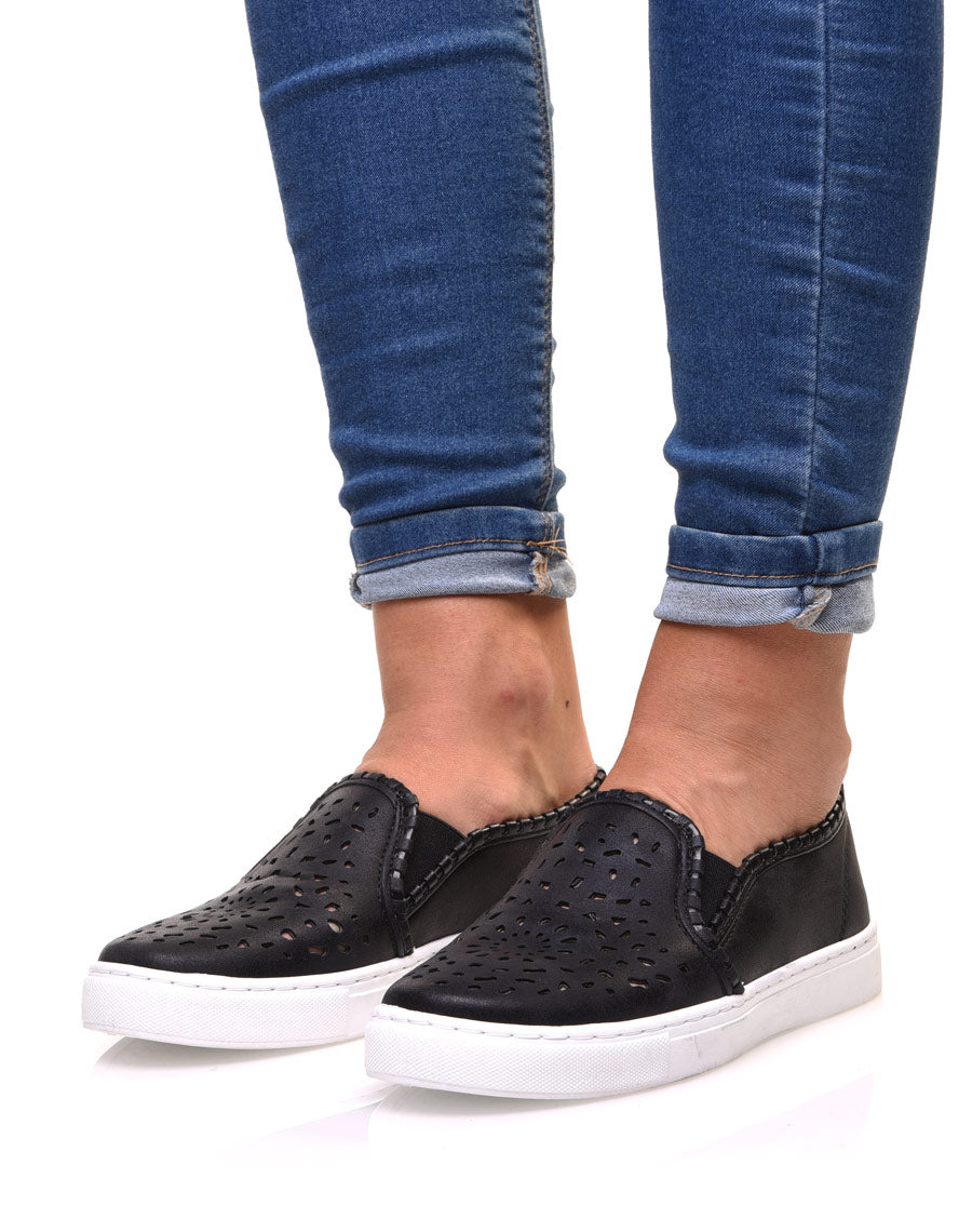 Slippers noirs à motifs ajourés