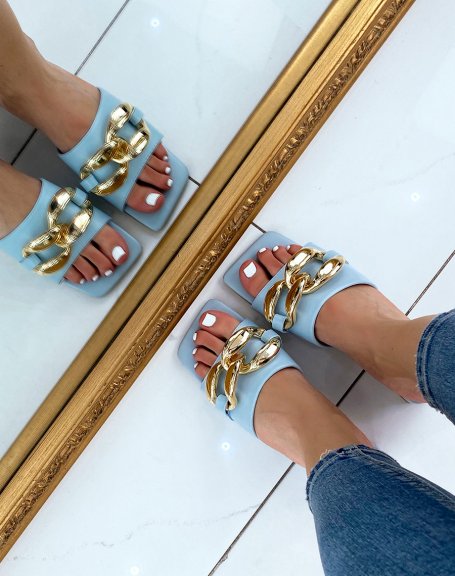 Baby blue mules with small heel and big chain