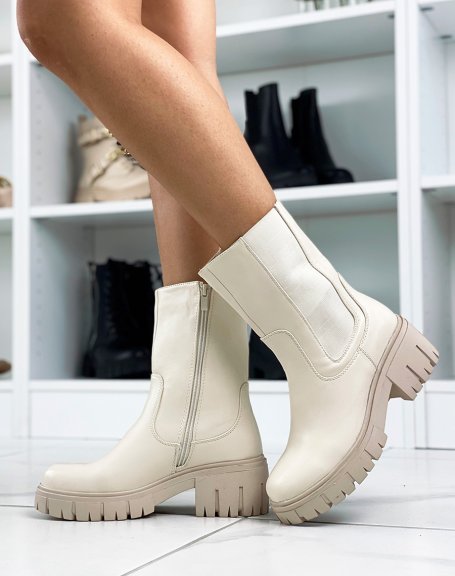 Beige ankle boots with notched sole