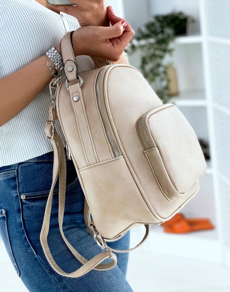 Beige backpack with silver zips