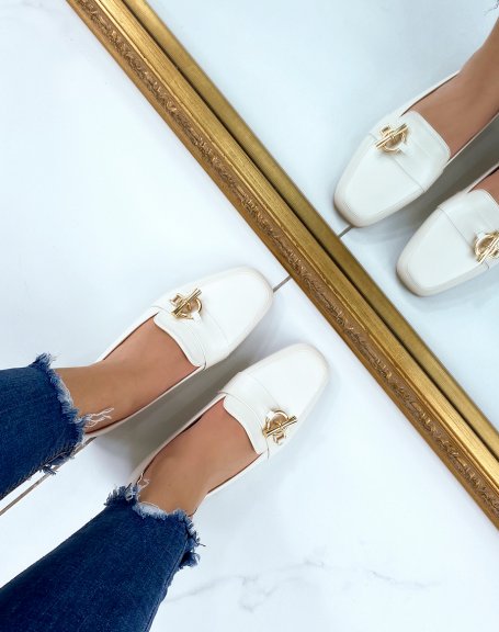 Beige loafers with golden buckle