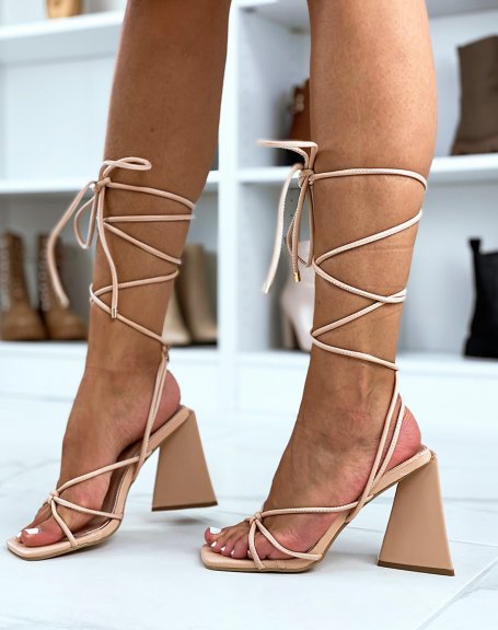 Beige sandals with laces and triangular heel