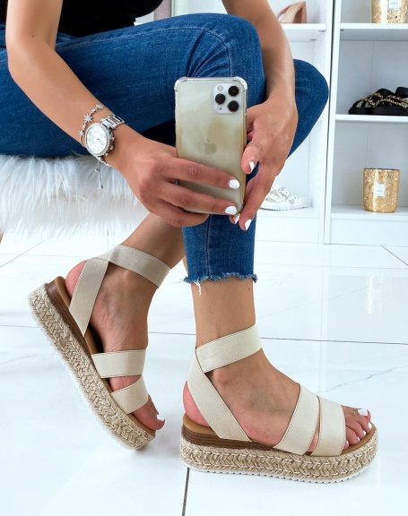 Beige sandals with multiple straps and jute sole