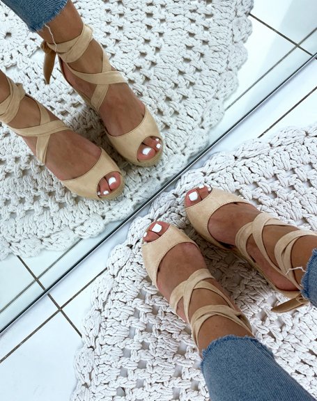 Beige suede wedges with crisscrossed laces