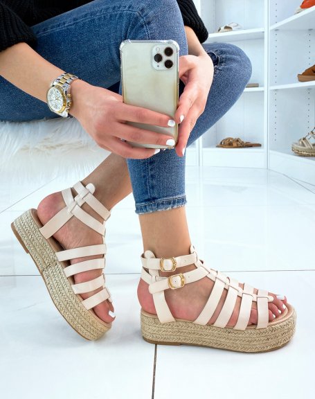 Beige wedge sandals with multiple straps